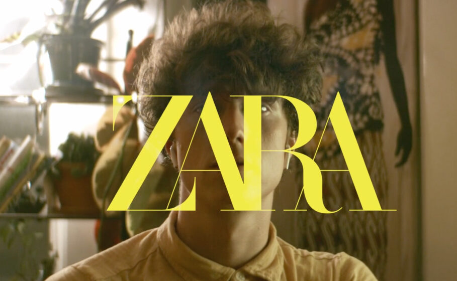 A young person with curly hair gazes upwards, surrounded by indoor plants and art, with the bold yellow text "ZARA" prominently displayed in the foreground.